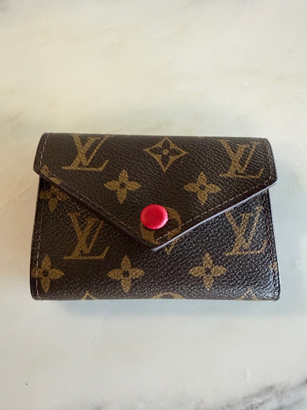 Monogram Compact Wallet in Brown with Red Snap- replication